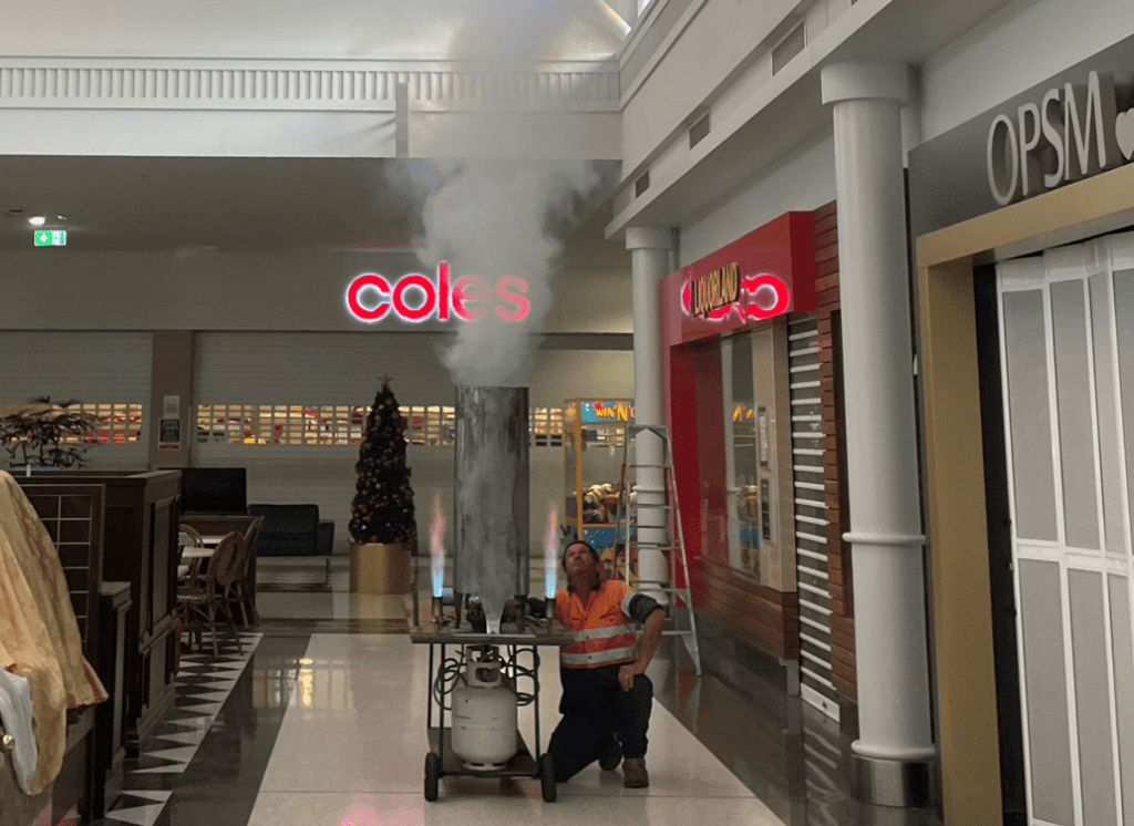 fire safety engineer conducting live tests inside a shopping centre