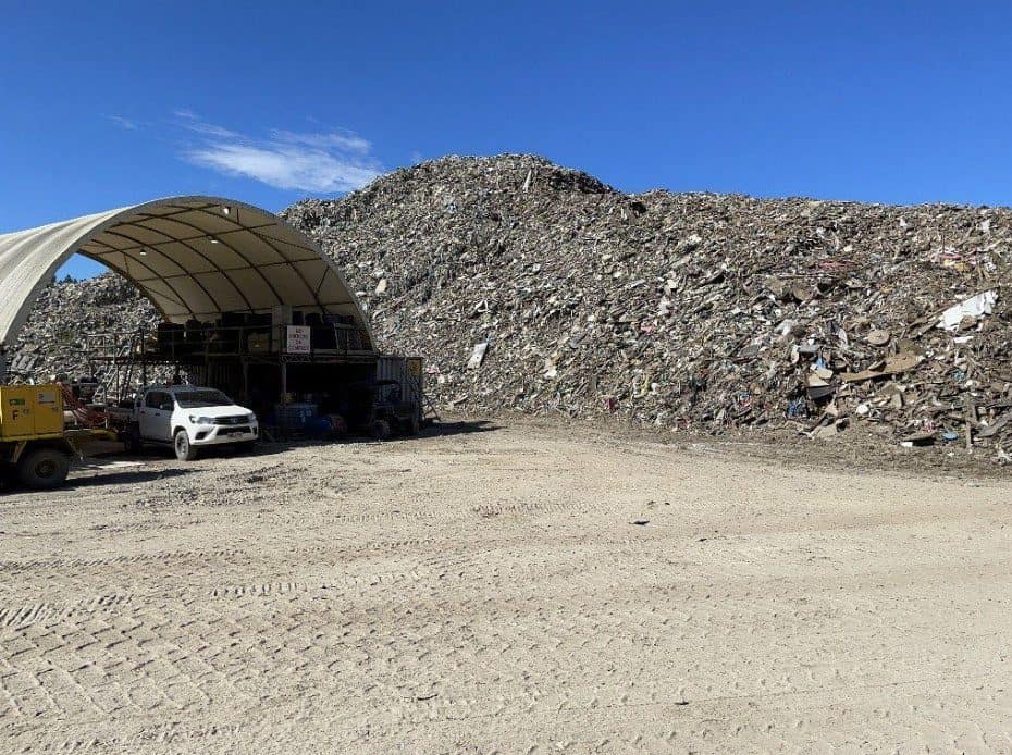 a large pile of materials in a recycling facility in caboolture queensland